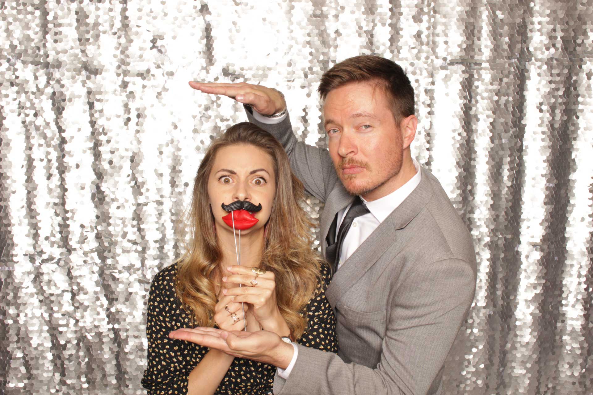 Modern Couple being silly in Photo Booth